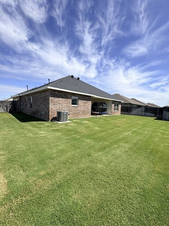 Back Yard, weekly mow lawn service in Abilene, TX
