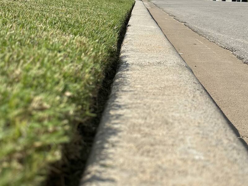 Clean-cut curb edge along the street, Abilene, TX